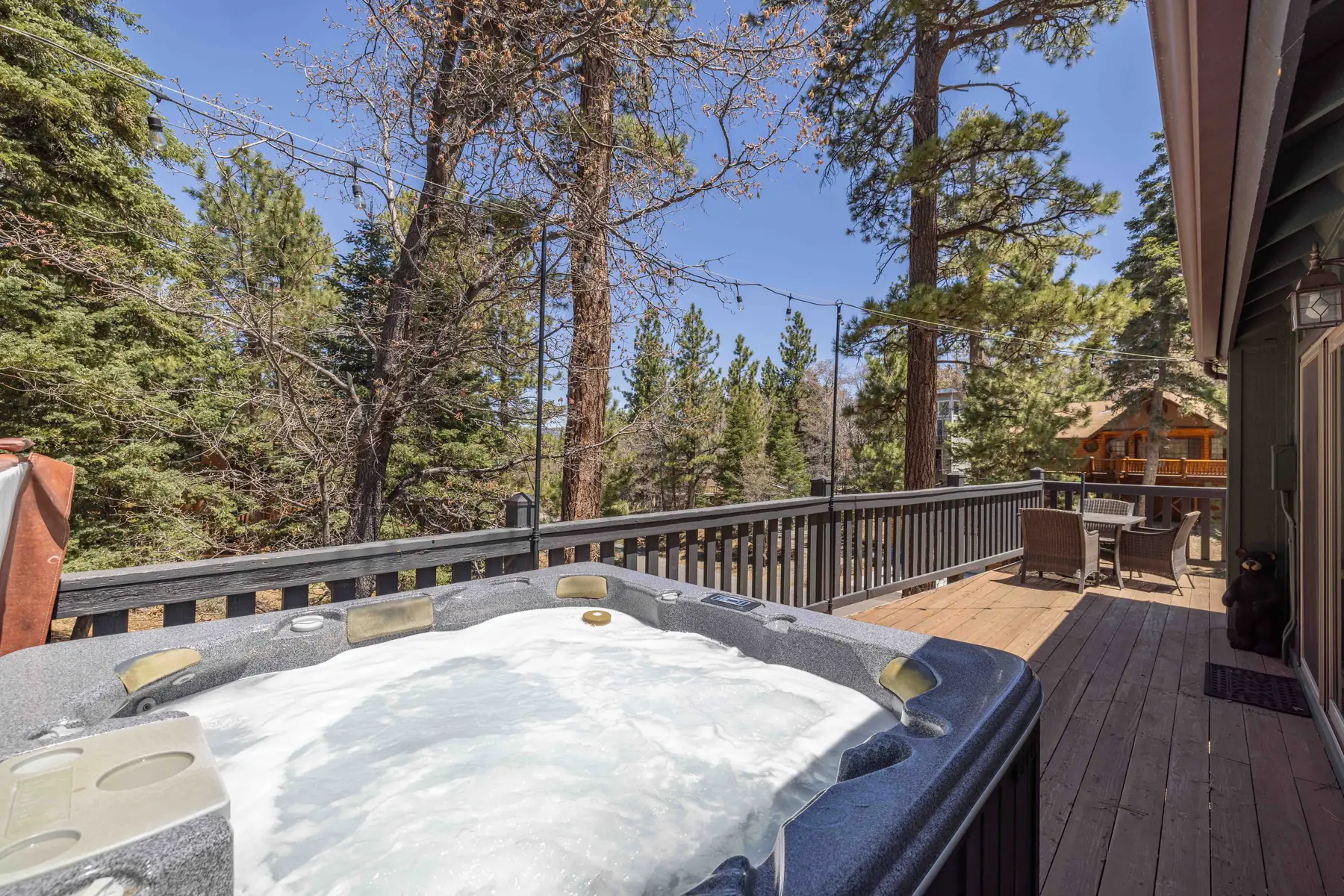 Pine Grove Cabin exterior surrounded by tall pines in the Moonridge area of Big Bear Lake